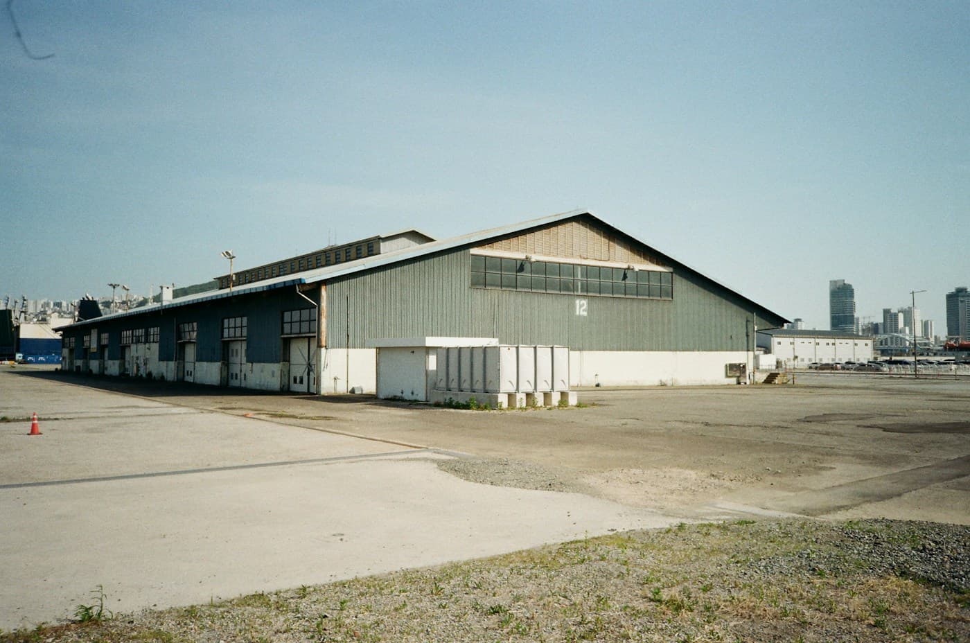 Industrial building beneath a clear blue sky